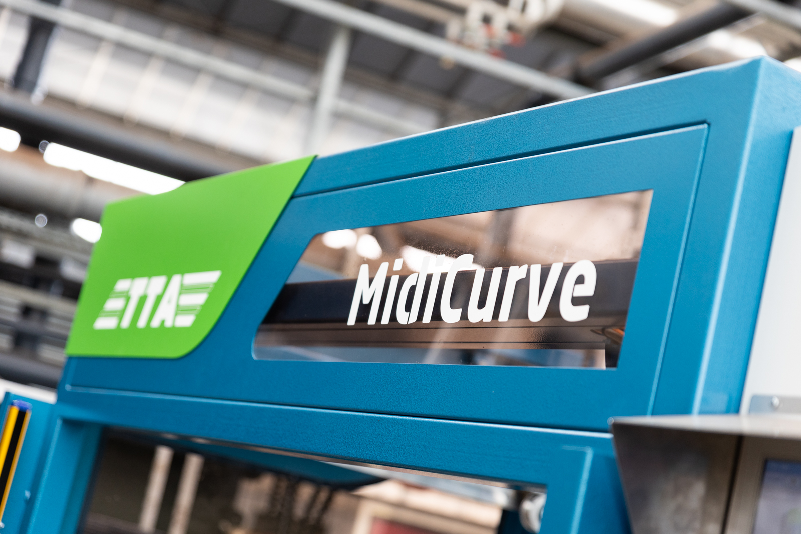 Nome da máquina MidiCurve, enchedora circular de potes da TTA-ISO